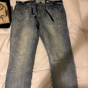 A pair of blue straight-leg jeans